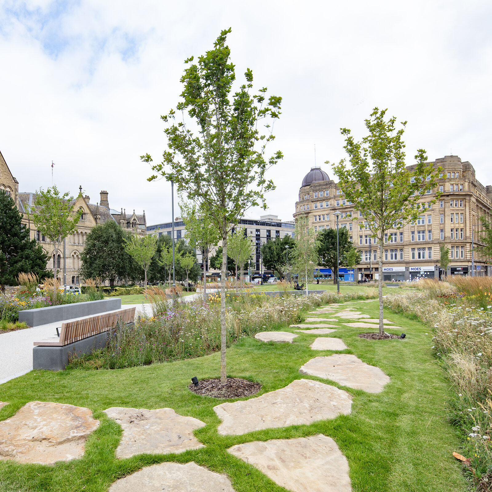 Bradford City Center landscaped garden with plants, trees and stone pathway