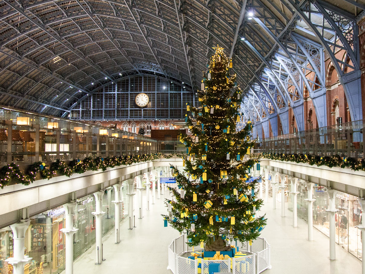 tall christmas tree installation for retail space